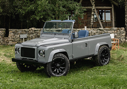 Topless retro-styled Defender helps F1 driver stand out at the beach